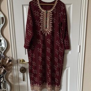 Elegant Burgundy Dress with Gold Accents